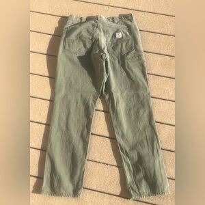 CARHARTT RUGGED FLEX 5 POCKET PANTS (34X34) USED. MENS GREEN IN COLOR.